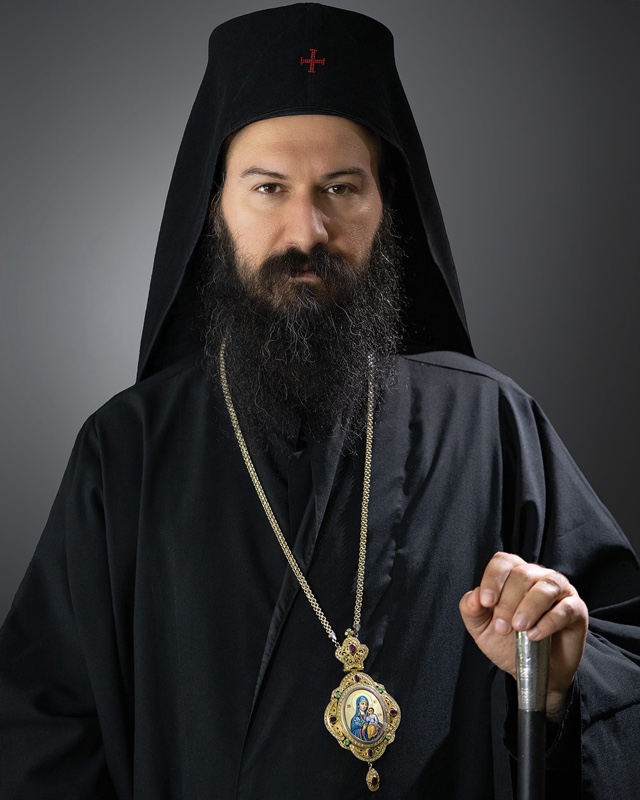 His Eminence Metropolitan Demetrius of America in monastic riassa and klobuk, wearing a panagia and holding his staff